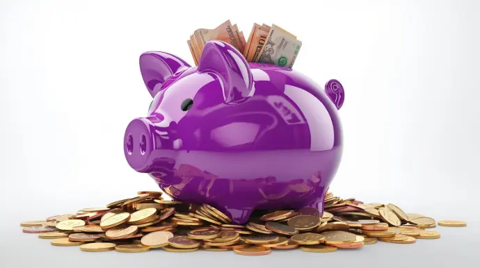 Overflowing purple piggy bank symbolizing efficient money flow management services